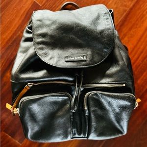 Vera Bradley Black Leather small backpack. Adjustable straps